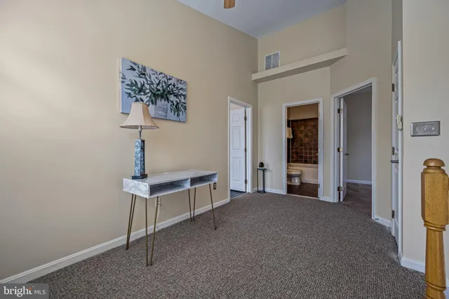 a view of a hallway with entryway