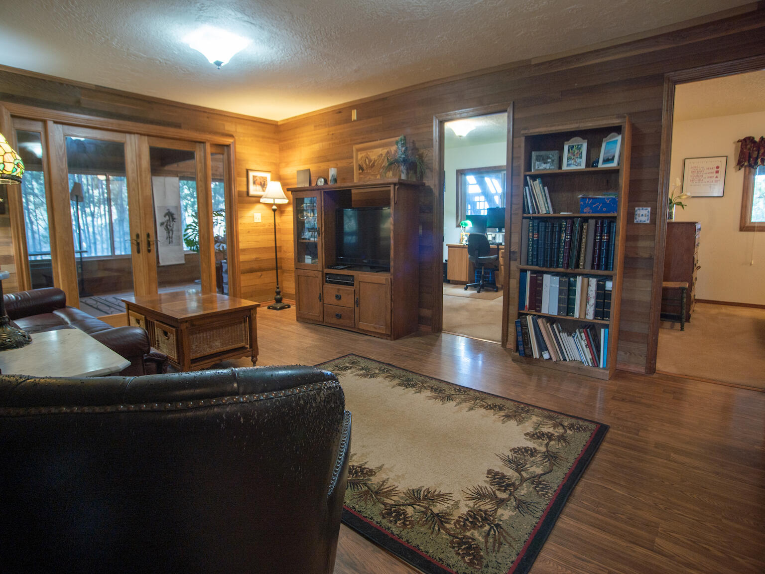 64295 Schibel Road Bend, OR 97703 - Photo 17 of 41 a room with furniture pool table and a flat screen tv