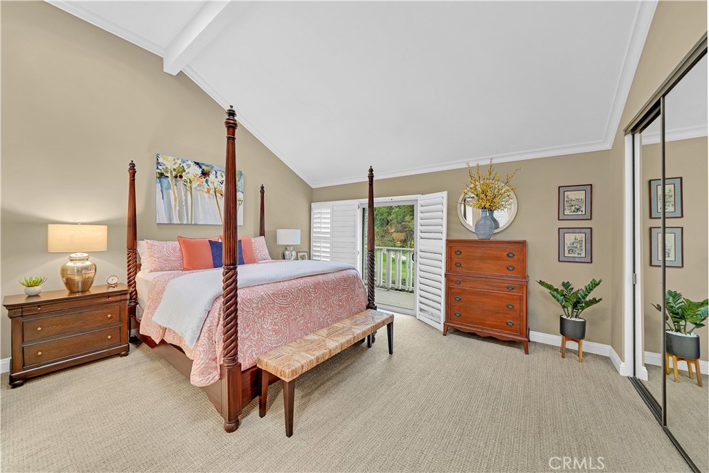 10 Crystal Pool, Unit 39 Irvine, CA 92603 - Photo 22 of 30 a bed room with a bed and a window