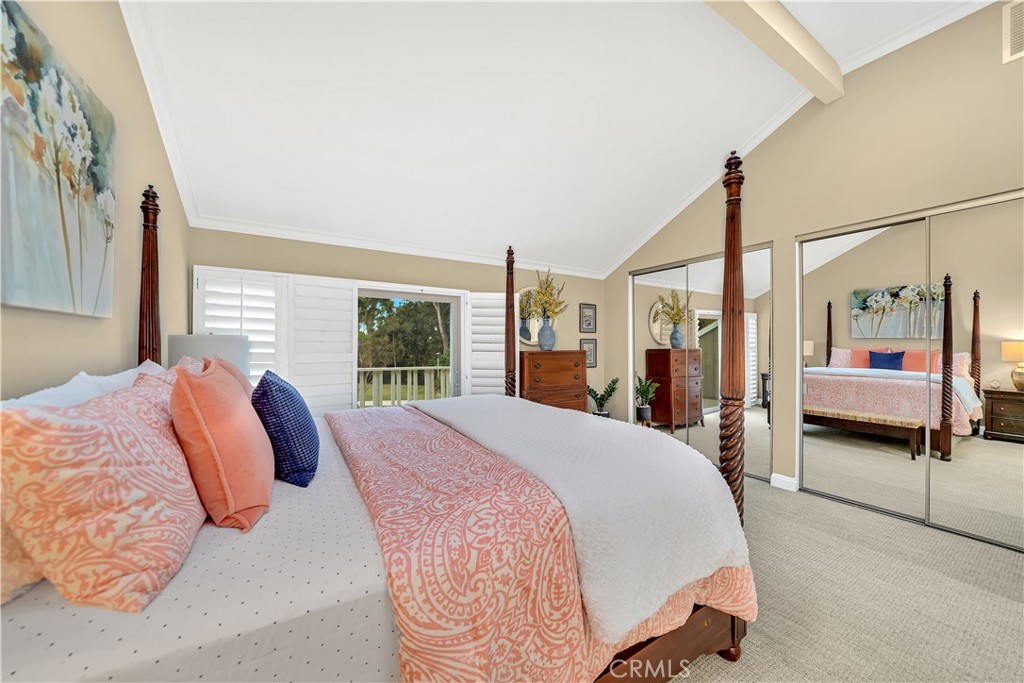 10 Crystal Pool, Unit 39 Irvine, CA 92603 - Photo 24 of 30 a bedroom with a large bed and a window