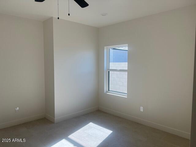 15988 South Yava Road Arizona City, AZ 85123 - Photo 12 of 21 an empty room with windows