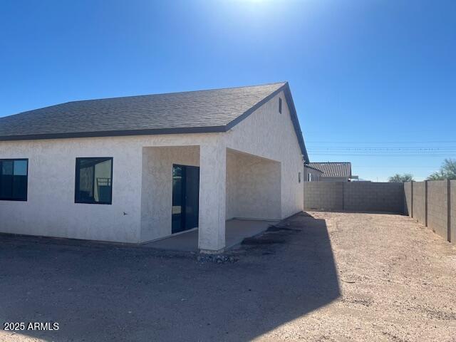 15988 South Yava Road Arizona City, AZ 85123 - Photo 5 of 21 a view of a house with a backyard
