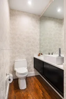 a bathroom with a sink and a toilet