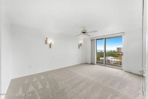 an empty room with sliding door