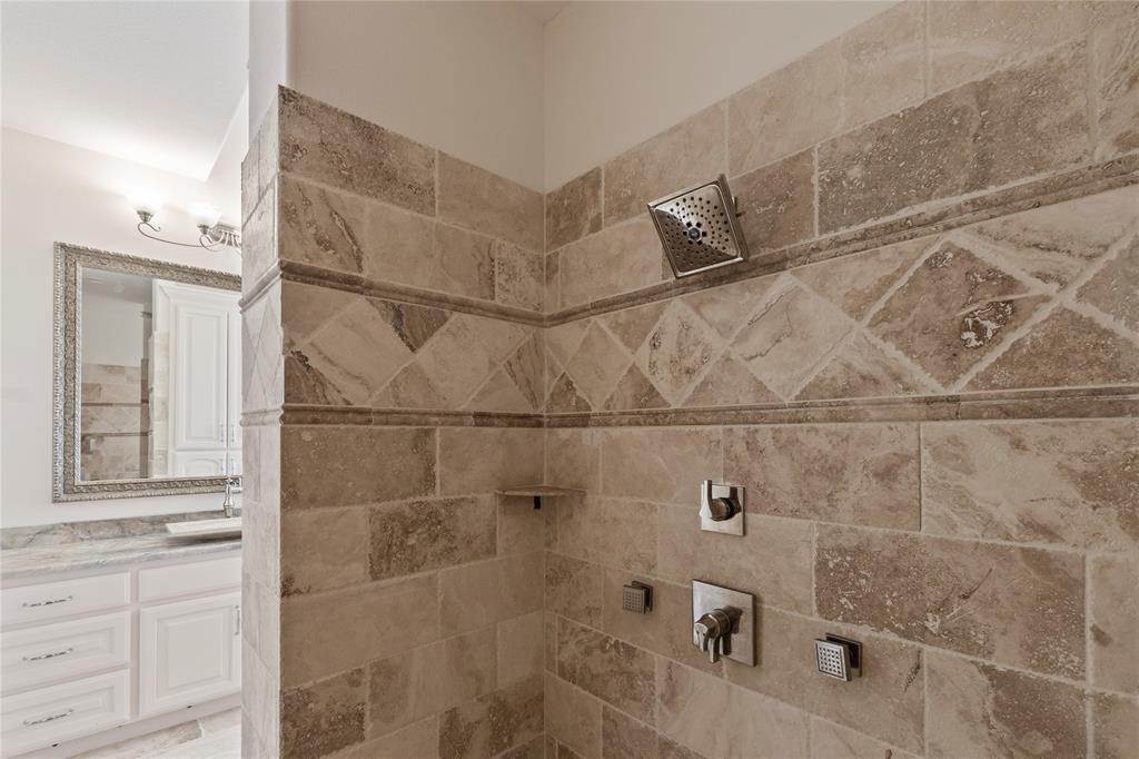 204 Pinnacle Club Place Mabank, TX 75156 - Photo 17 of 40 Primary ensuite bath with spacious and beautiful walk-in shower