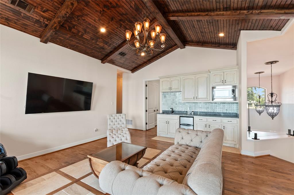 204 Pinnacle Club Place Mabank, TX 75156 - Photo 22 of 40 Additional view of Bonus room with wet bar and beverage fridge and microwave.