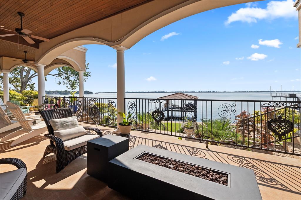 204 Pinnacle Club Place Mabank, TX 75156 - Photo 34 of 40 Covered patio with outdoor kitchen and seating space.