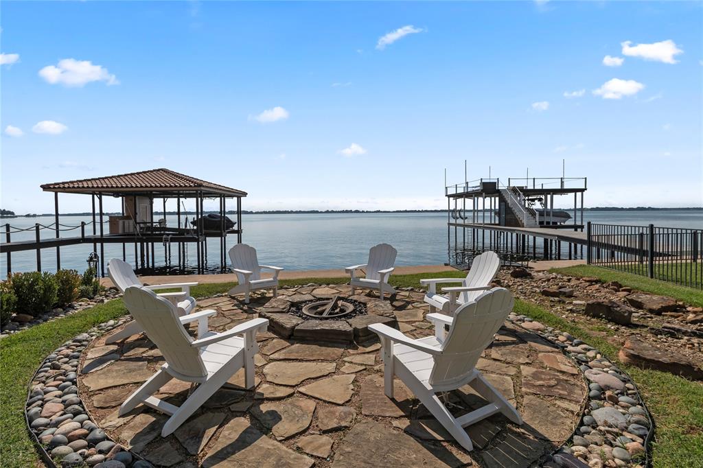 204 Pinnacle Club Place Mabank, TX 75156 - Photo 37 of 40 Evenings by the firepit—marshmallows in hand, sunset on the horizon.