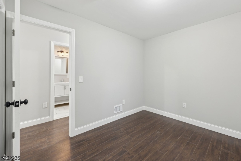 253 North 4th Street Paterson, NJ 07522 - Photo 9 of 15 wooden floor in an empty room