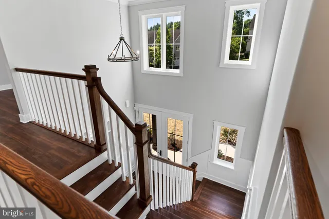 a view of a hallway with windows