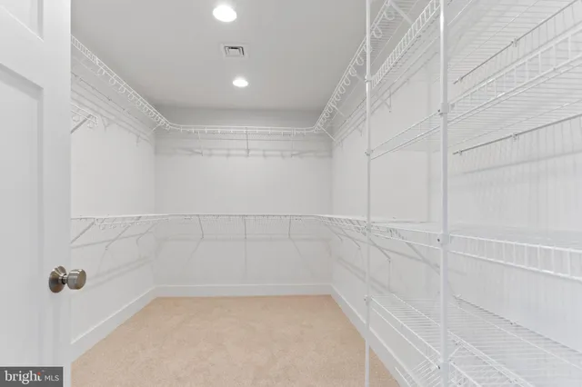 a bathroom with a granite countertop sink mirror and a