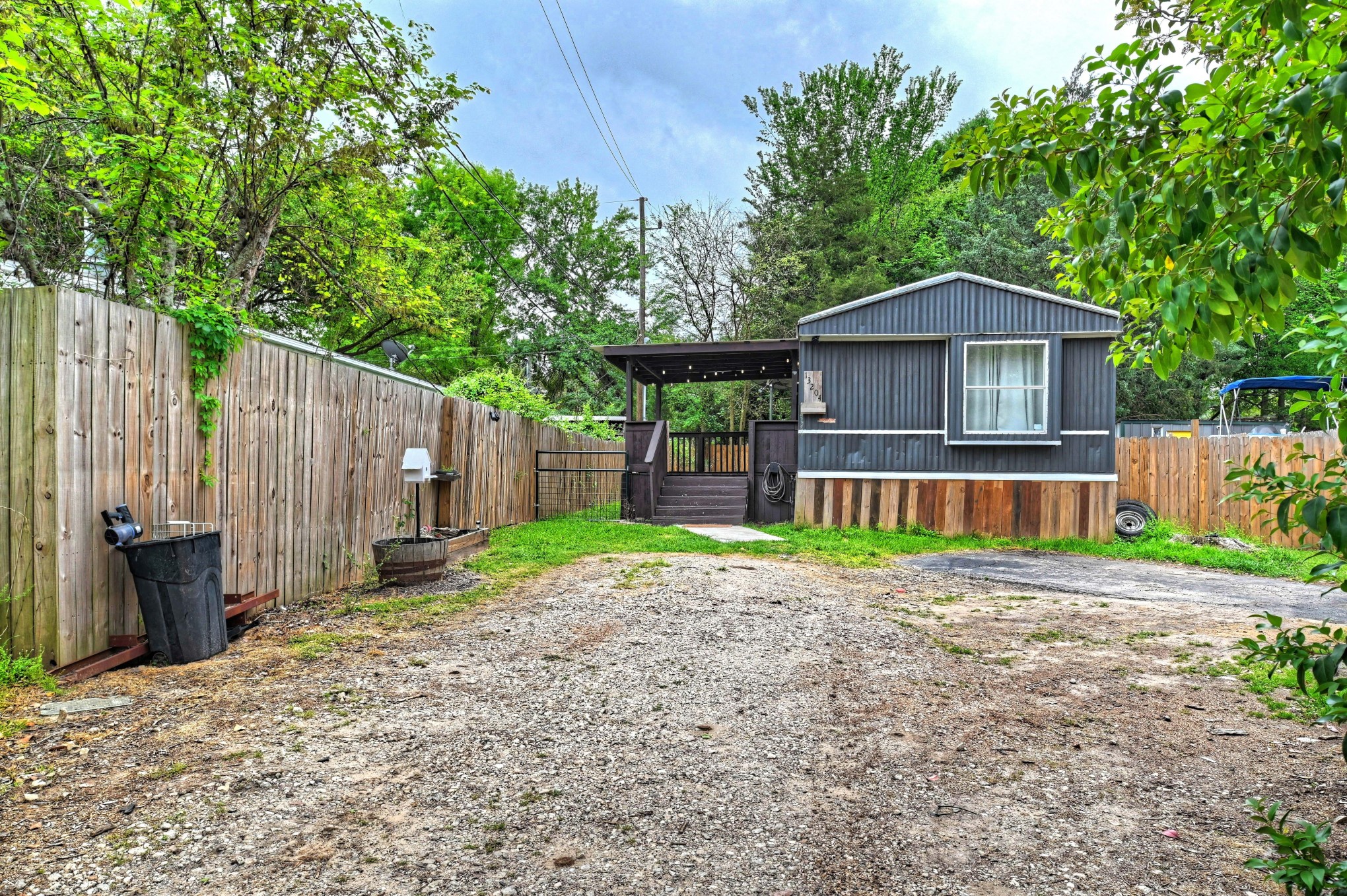 13204 Enchanted Vista Willis, TX 77318 - Photo 1 of 43 a view of a house with a yard and large tree