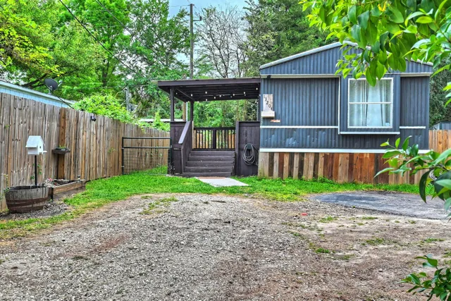 a view of a backyard with a garden