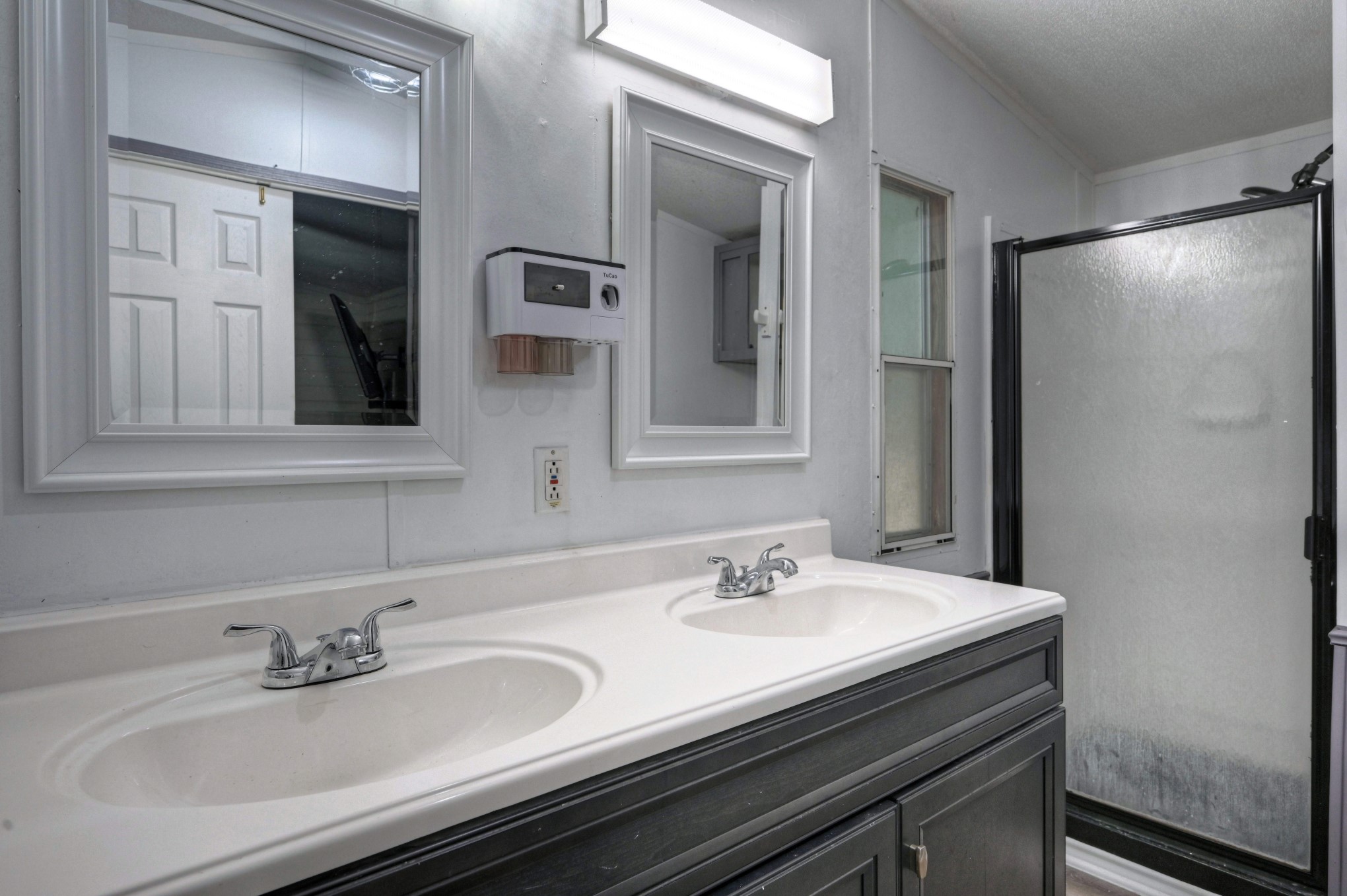 13204 Enchanted Vista Willis, TX 77318 - Photo 28 of 43 a bathroom with a sink and a mirror