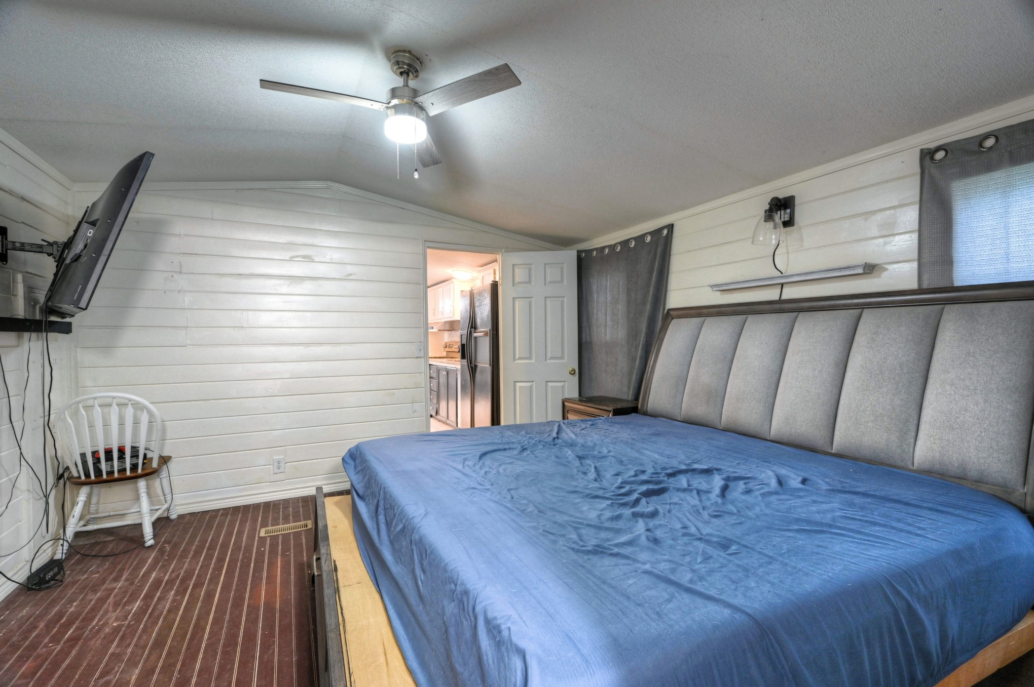 13204 Enchanted Vista Willis, TX 77318 - Photo 30 of 43 a bedroom with a bed and a view of balcony