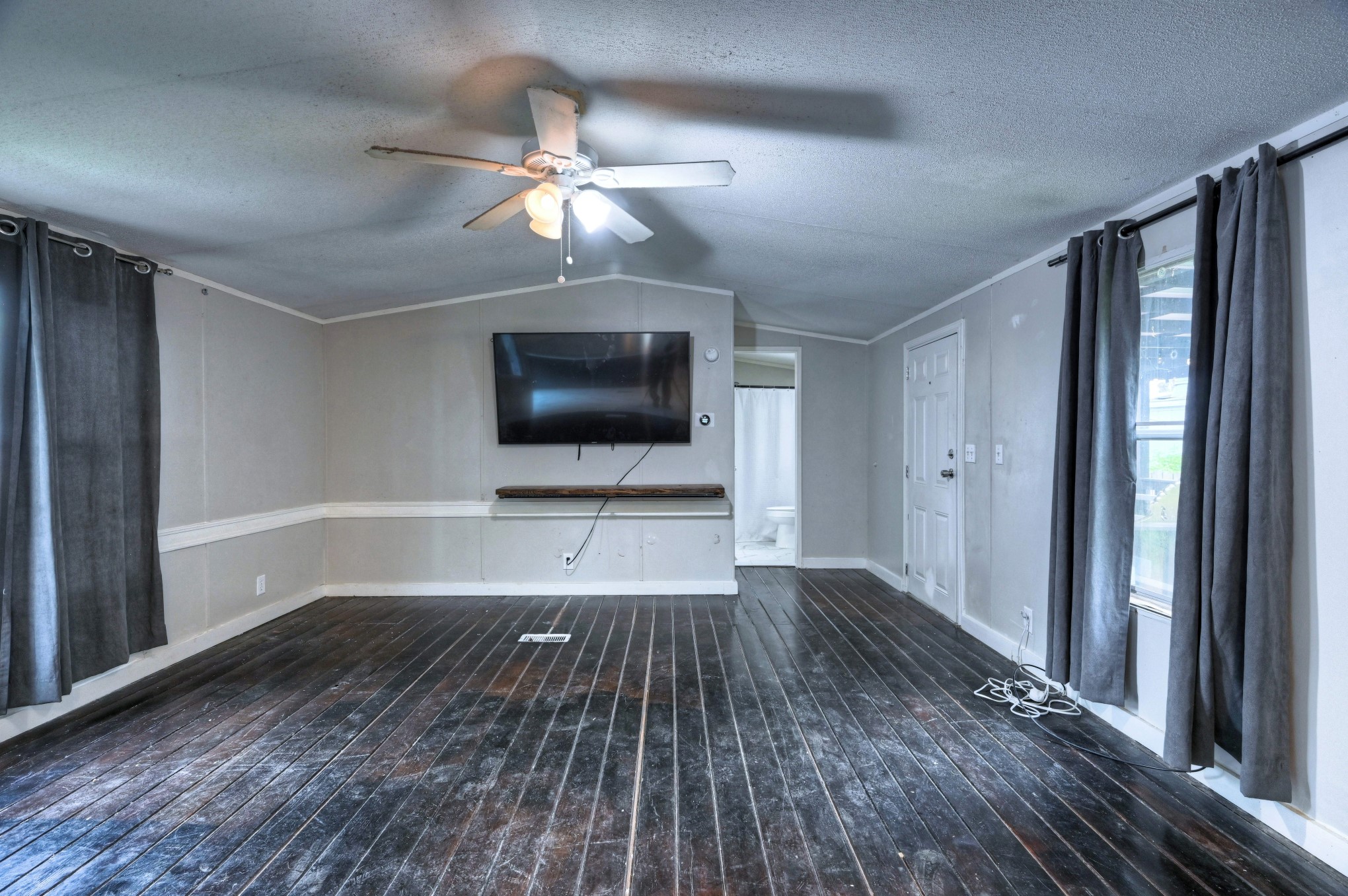 13204 Enchanted Vista Willis, TX 77318 - Photo 36 of 43 wooden floor in an empty room with a window