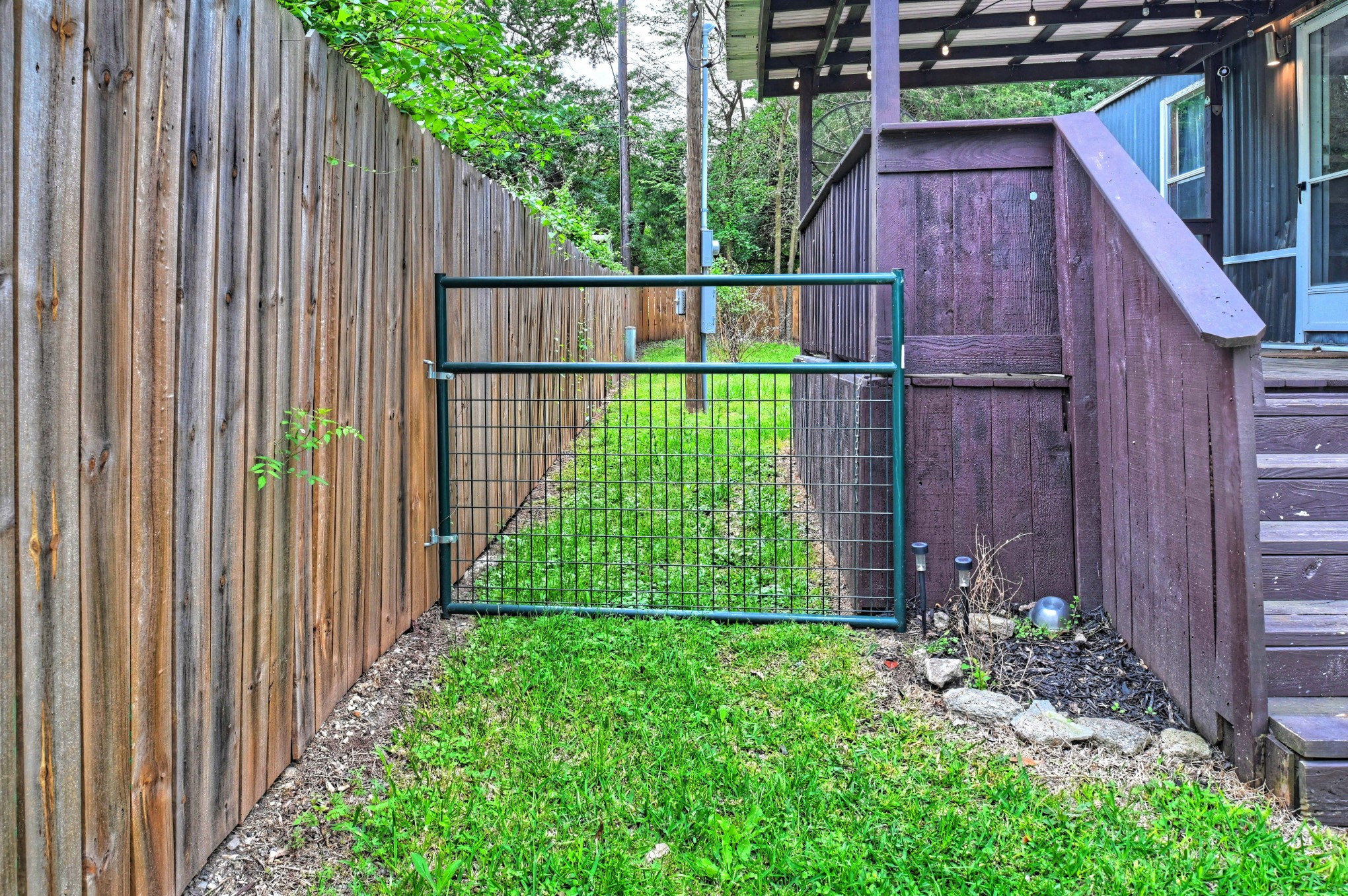 13204 Enchanted Vista Willis, TX 77318 - Photo 4 of 43 a view of a backyard with garden