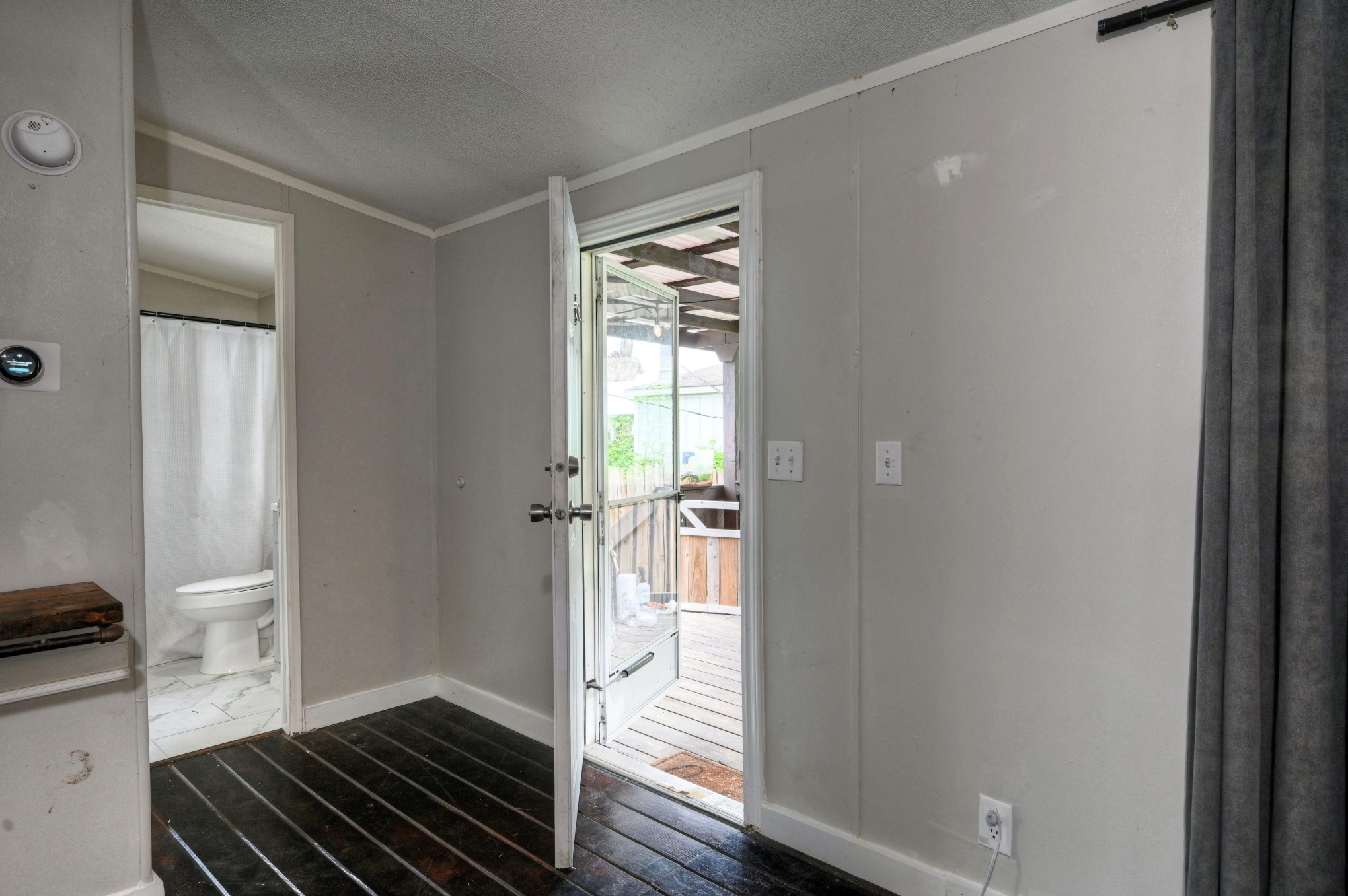 13204 Enchanted Vista Willis, TX 77318 - Photo 42 of 43 a view of a room that has a bed and wooden floor