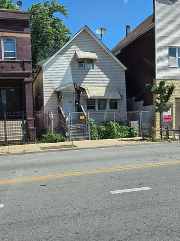 front view of a house with a street