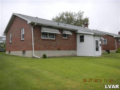 1111 Ridge Avenue Allentown, PA 18102 - Photo 1 of 10 a view of a house with a yard