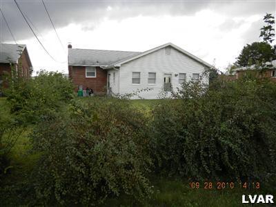 1111 Ridge Avenue Allentown, PA 18102 - Photo 3 of 10 a view of a house with backyard and garden