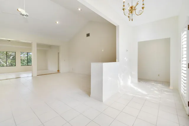 a view of houses with outdoor space and lake view