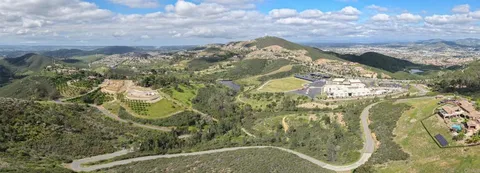 a view of a lake from a balcony