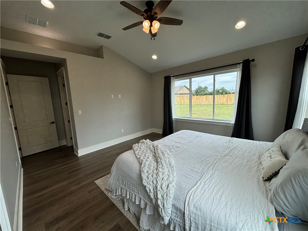 110 Hiram Cook Blanco, TX 78606 - Photo 39 of 46 a bedroom with a bed and a window