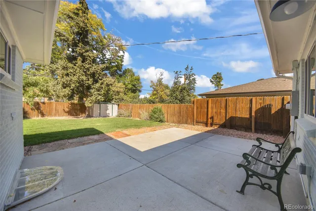 a view of swimming pool with seating space