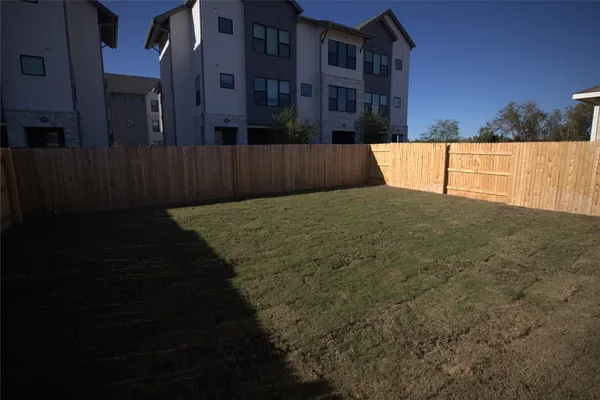 a view of an house with backyard space