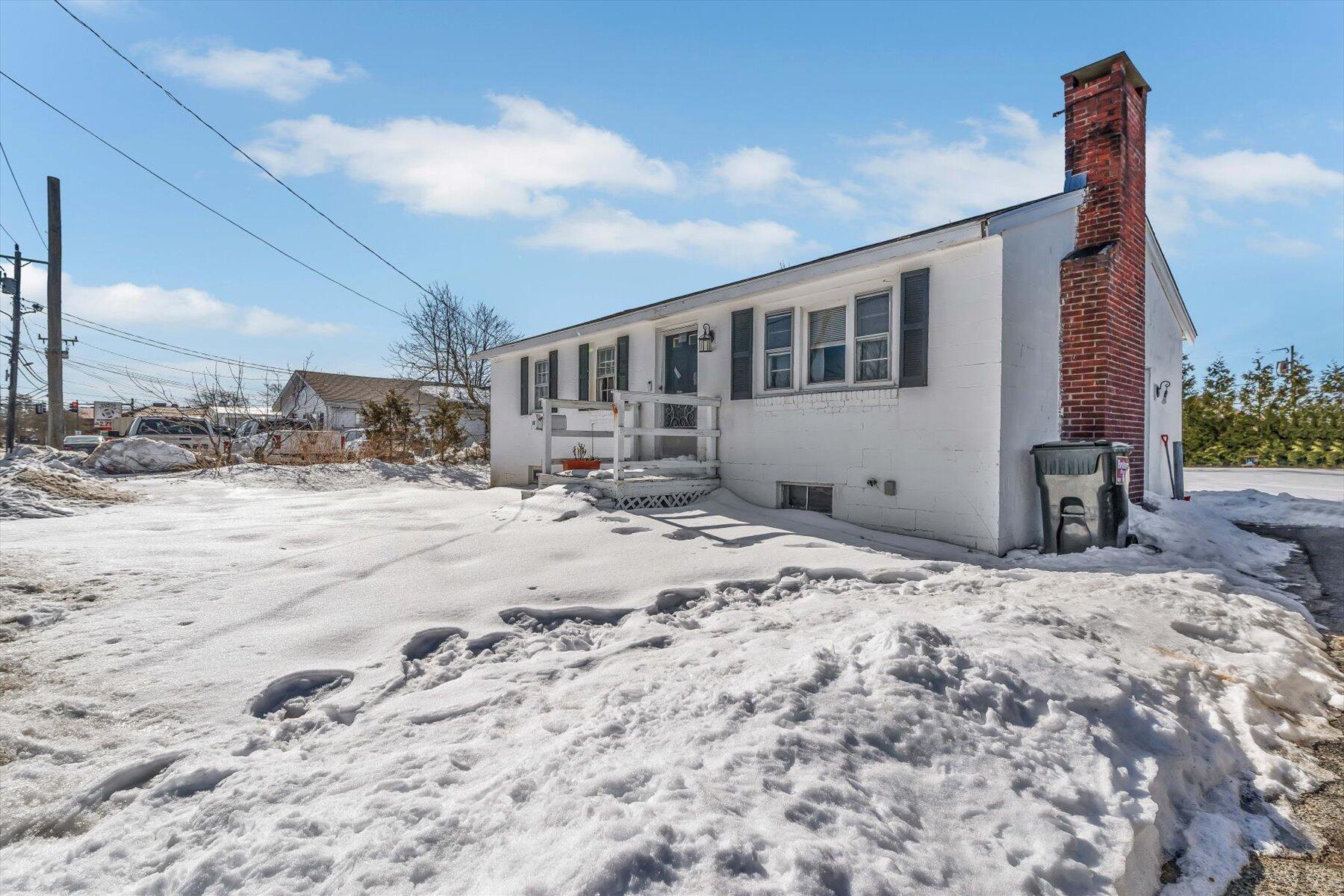 97 Bassett Lane Hyannis, MA 02601 - Photo 2 of 24 a view of a house with a yard