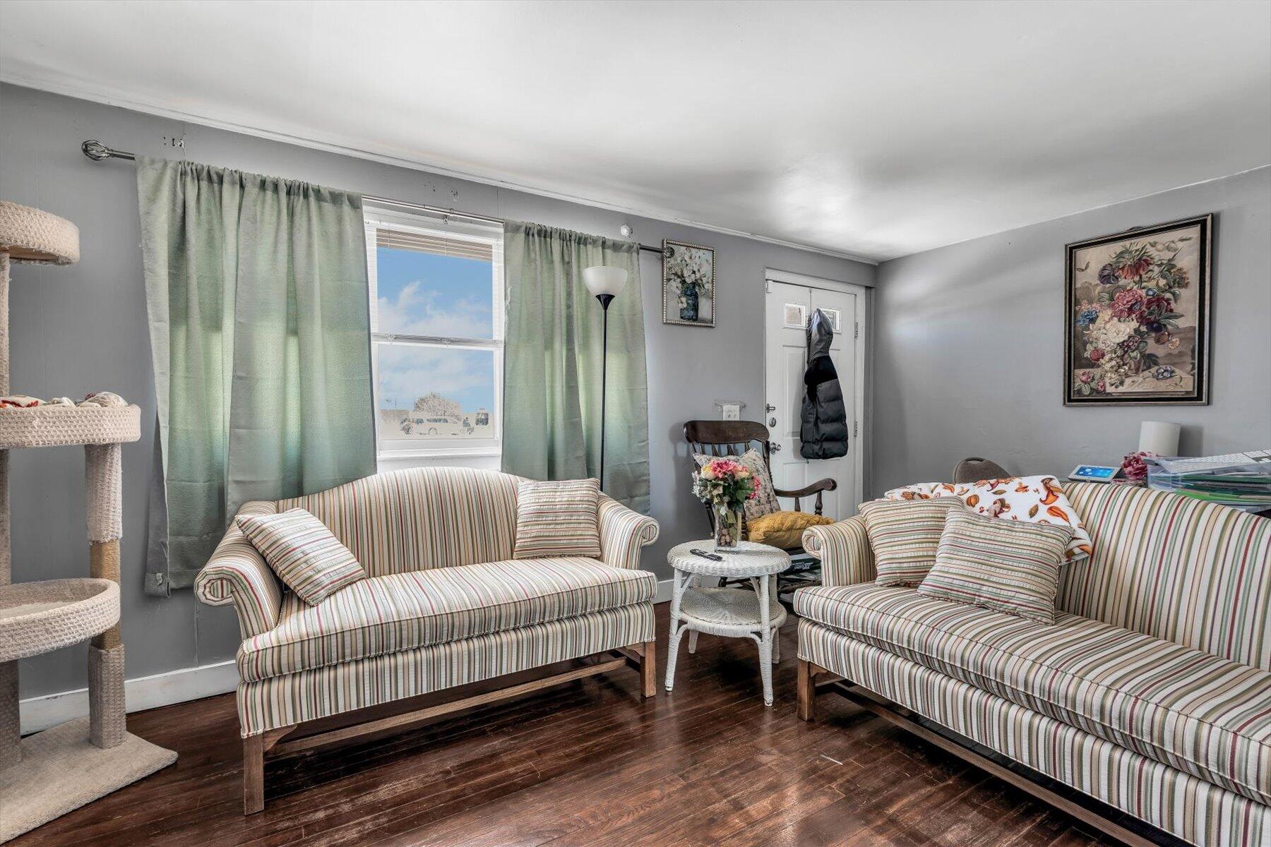97 Bassett Lane Hyannis, MA 02601 - Photo 4 of 24 a living room with furniture and a large window