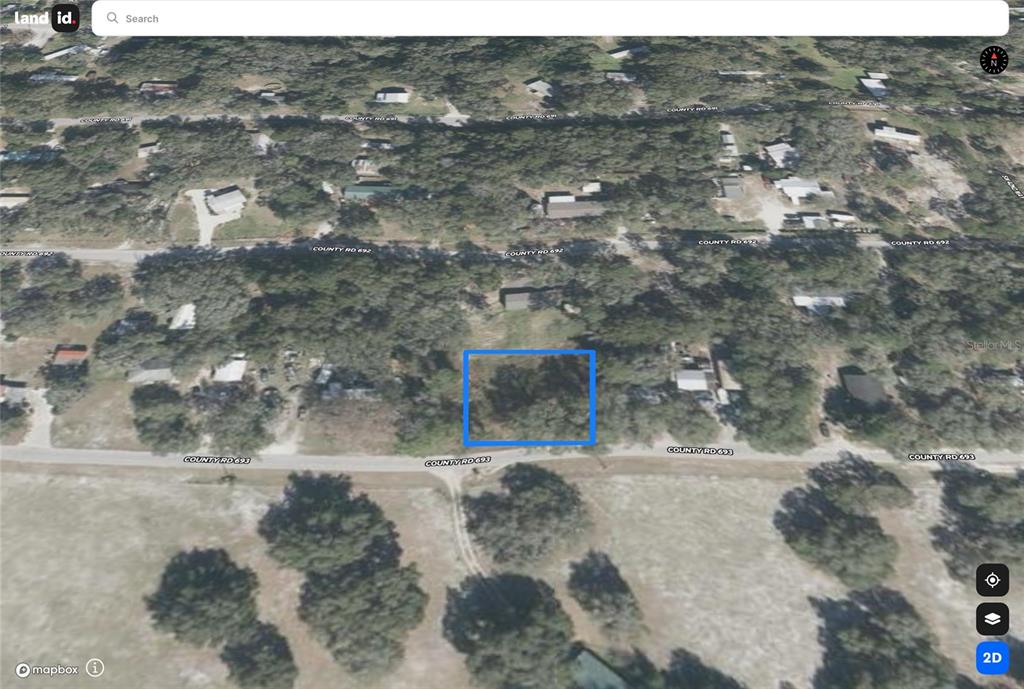 693 C R 693 Webster, FL 33597 - Photo 3 of 4 a view of outdoor space and yard