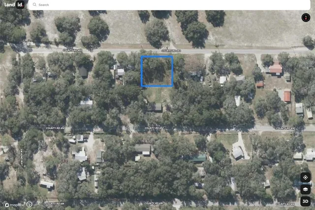 a view of city and green space