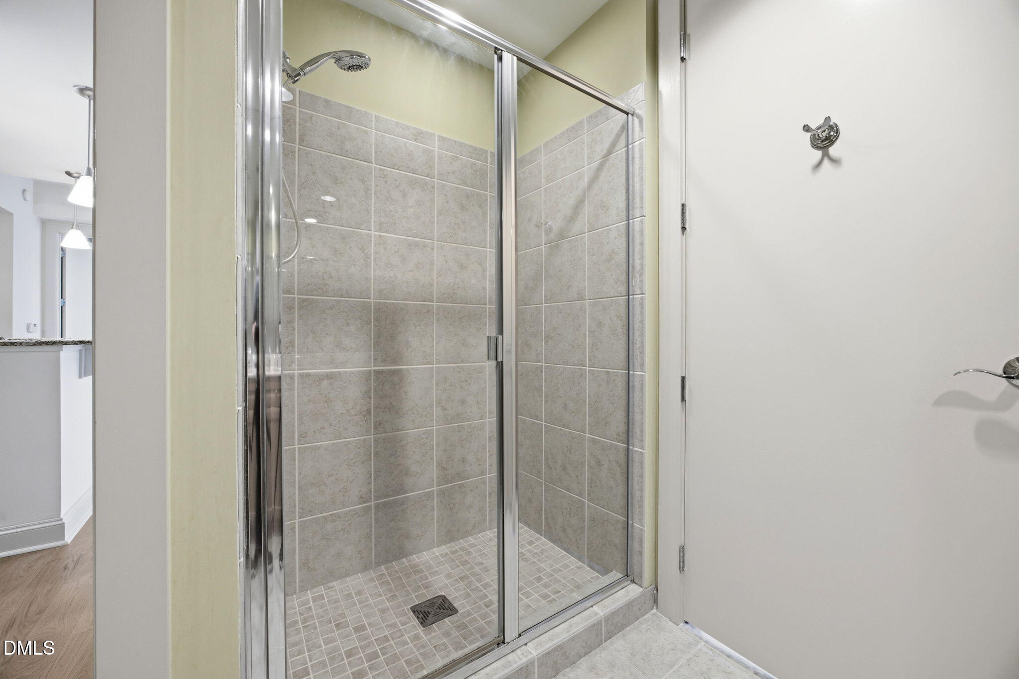 618 North Boylan Avenue, Unit 800 Raleigh, NC 27603 - Photo 13 of 25 a bathroom with a glass shower door