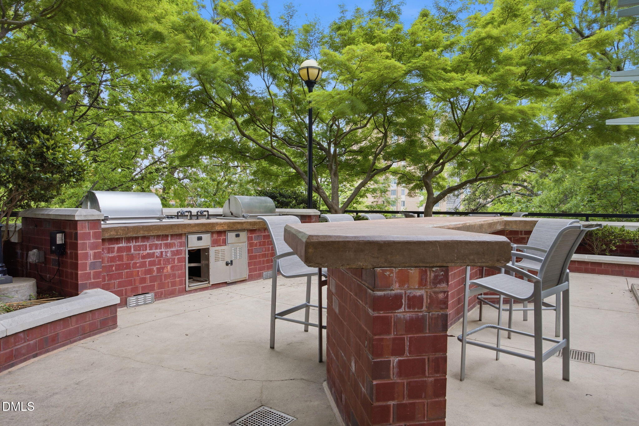 618 North Boylan Avenue, Unit 800 Raleigh, NC 27603 - Photo 18 of 25 a patio with table and chairs