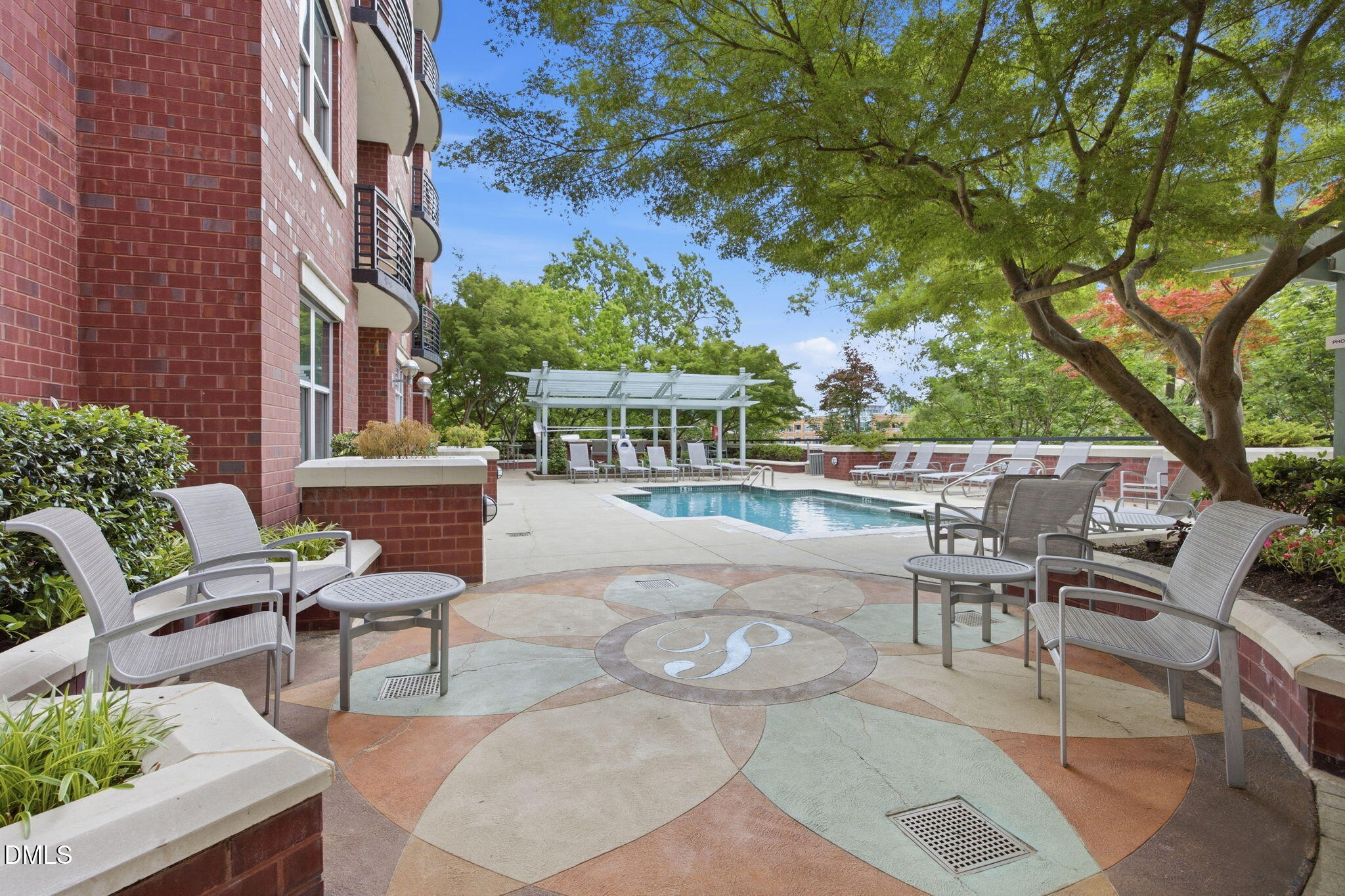 618 North Boylan Avenue, Unit 800 Raleigh, NC 27603 - Photo 19 of 25 a view of a patio with couches table and chairs and potted plants