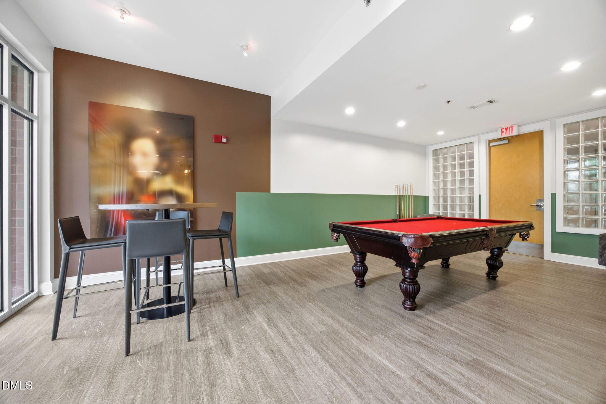 618 North Boylan Avenue, Unit 800 Raleigh, NC 27603 - Photo 23 of 25 a room with wooden floor pool table and windows