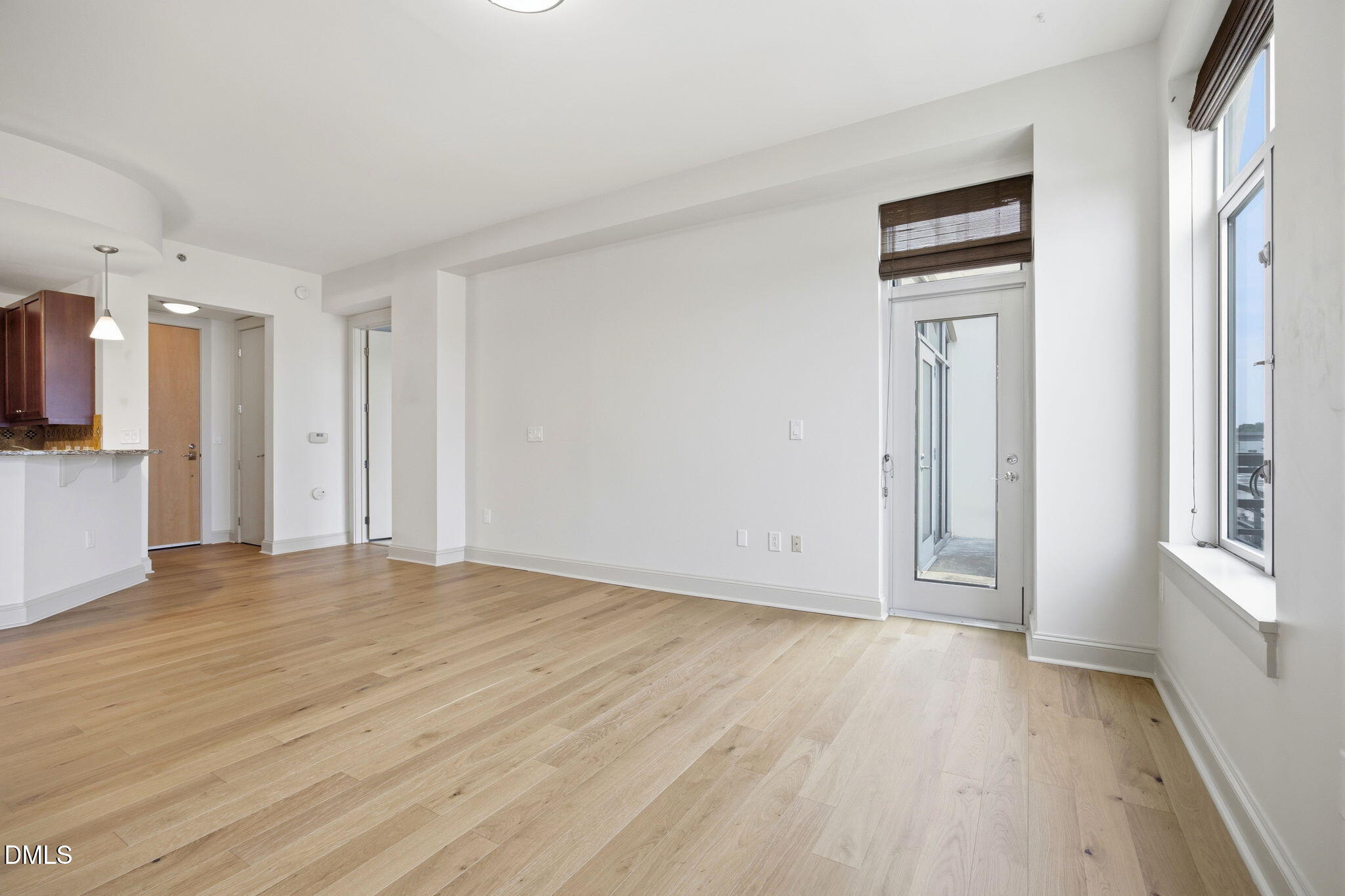 618 North Boylan Avenue, Unit 800 Raleigh, NC 27603 - Photo 6 of 25 a view of empty room with wooden floor and fan