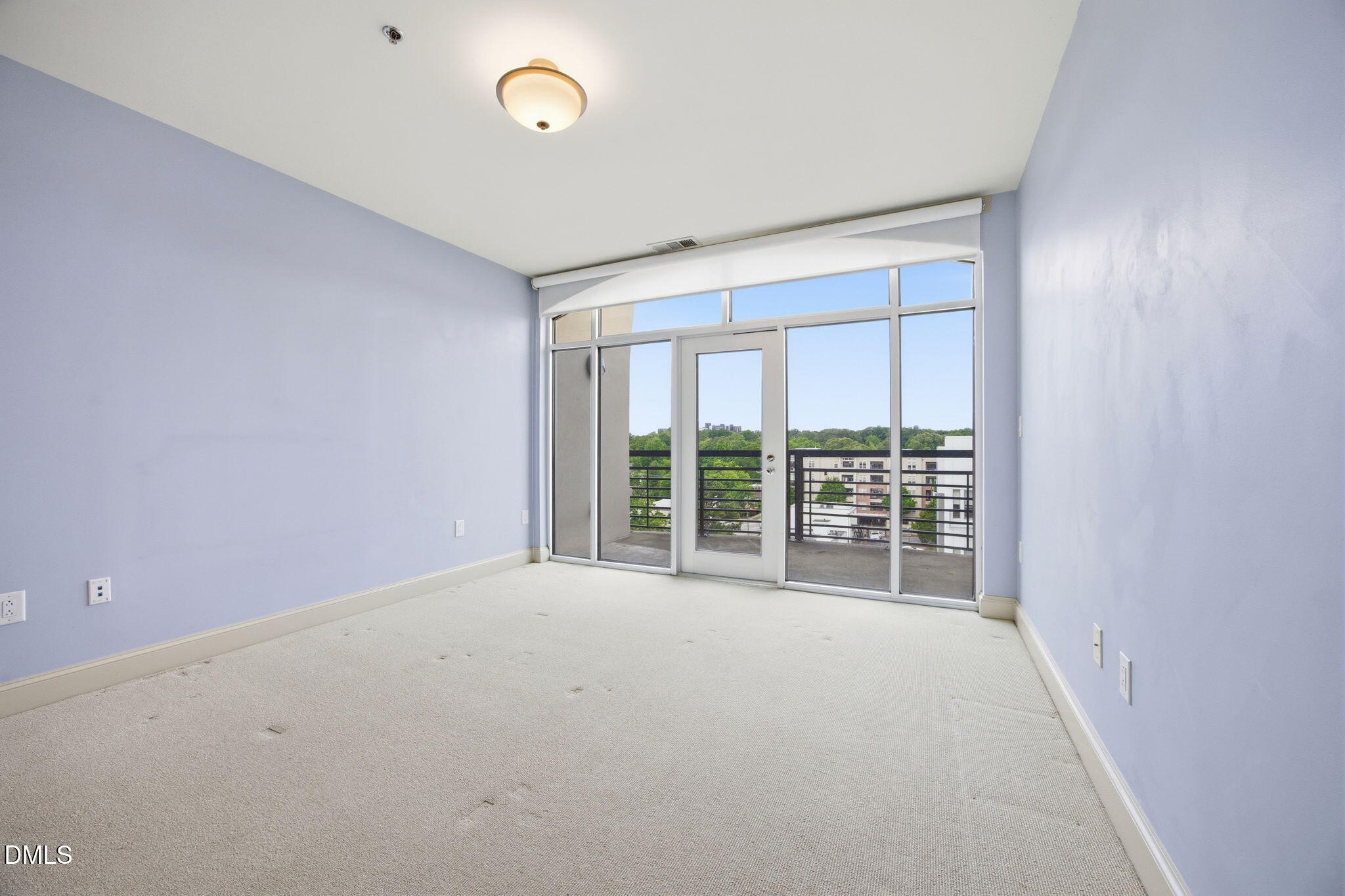 618 North Boylan Avenue, Unit 800 Raleigh, NC 27603 - Photo 8 of 25 wooden floor and window in an empty room