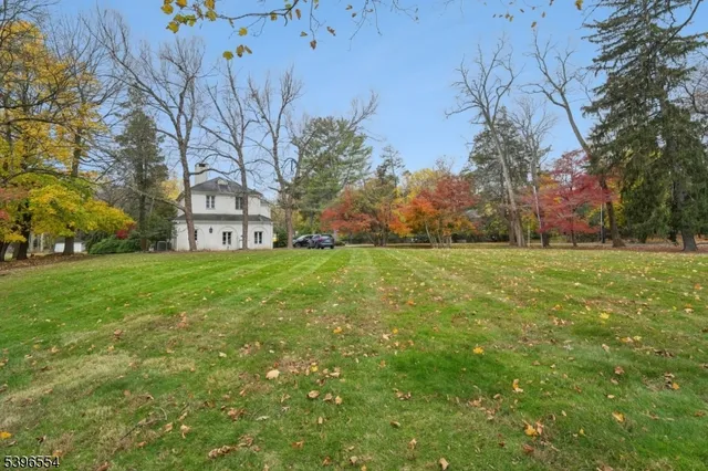 a view of a house with a big yard