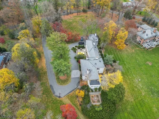 an aerial view of residential house with outdoor space