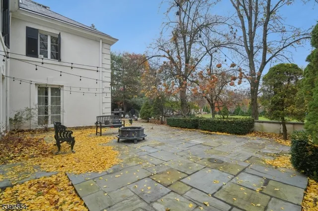 a view of swimming pool with sitting area