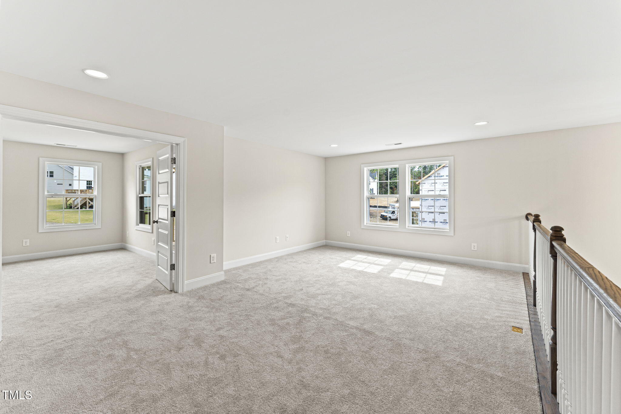 134 Ivy Rdg Road Chapel Hill, NC 27516 - Photo 19 of 37 an empty room with windows and entrance