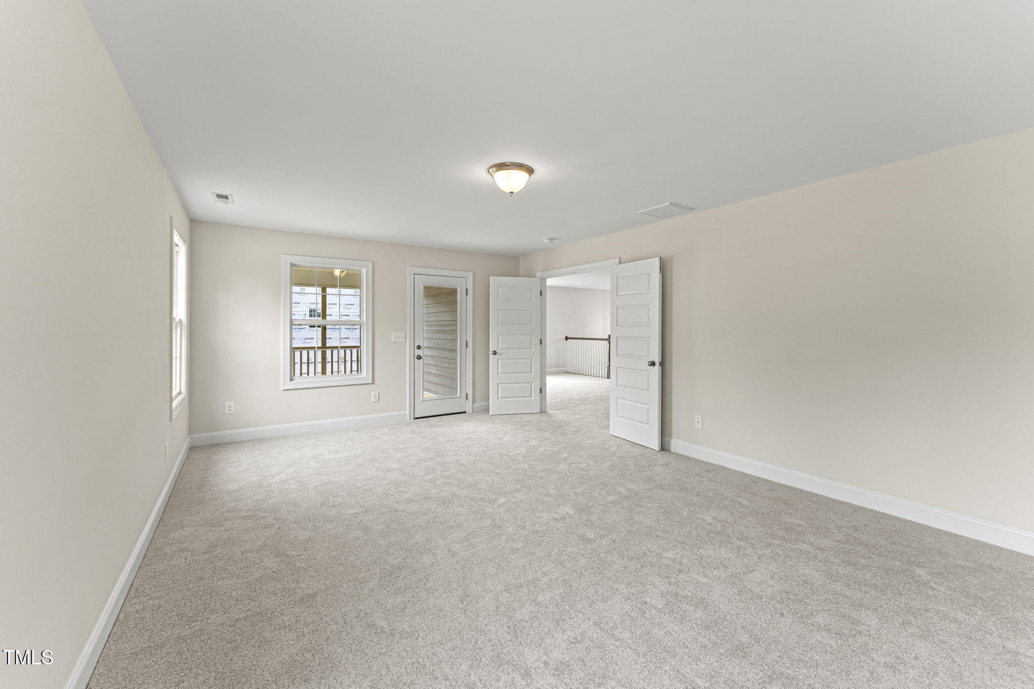 134 Ivy Rdg Road Chapel Hill, NC 27516 - Photo 20 of 37 an empty room with windows and closet