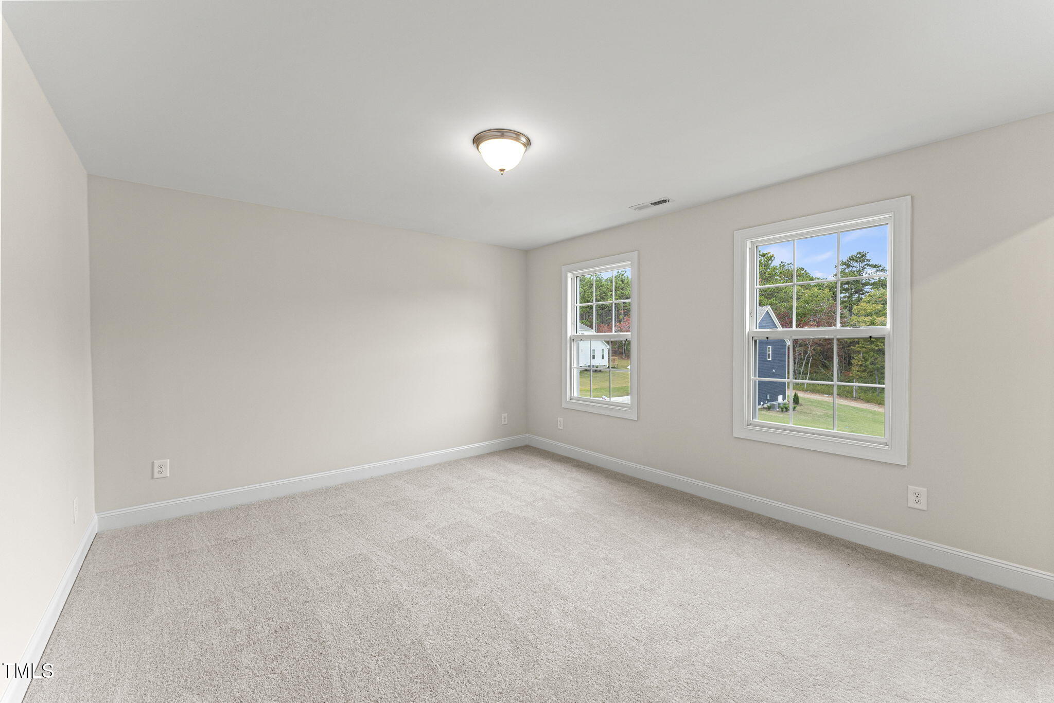 134 Ivy Rdg Road Chapel Hill, NC 27516 - Photo 28 of 37 an empty room with windows