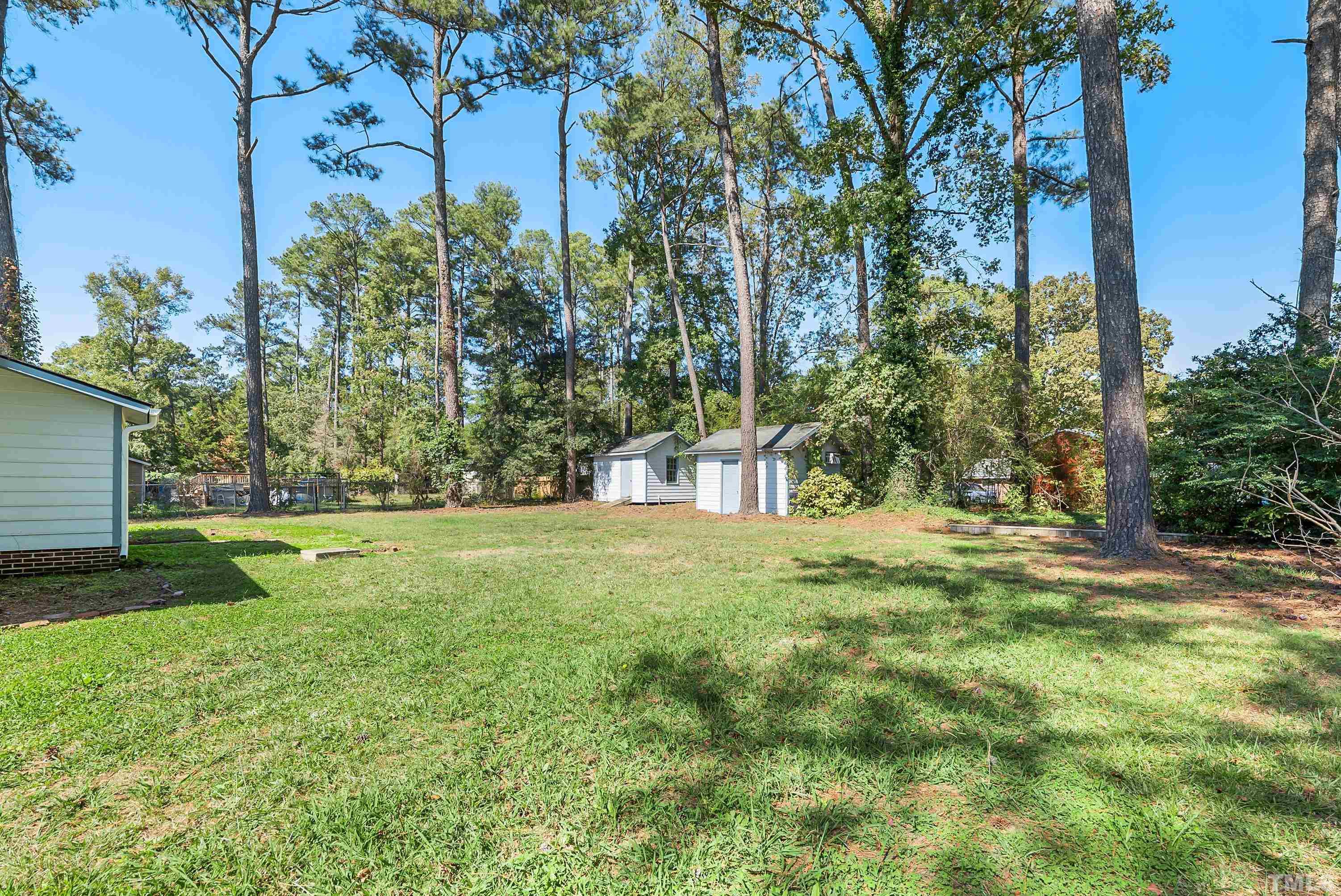 6301 Poole Road Raleigh, NC 27610 - Photo 20 of 20 a view of a yard with a tree