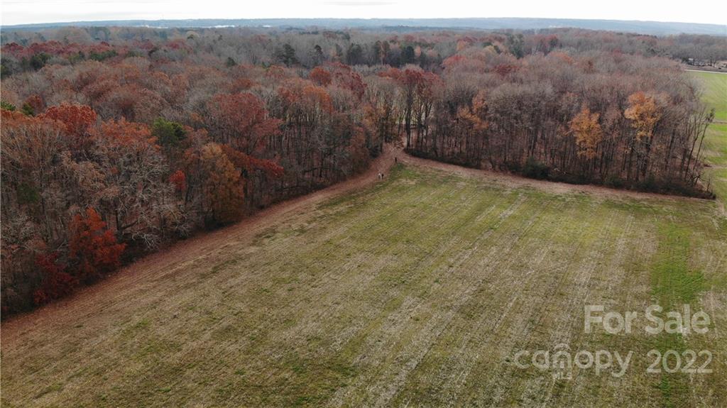 5819 Stack Road, Unit 2 Monroe, NC 28112 - Photo 6 of 39 a view of a yard with an outdoor space
