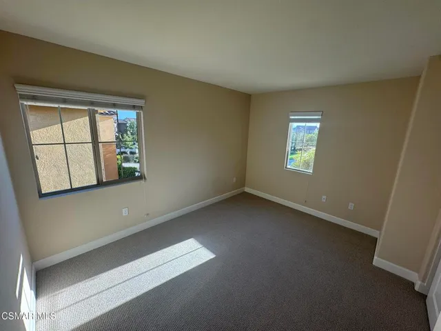 a bathroom with a double vanity sink mirror and double