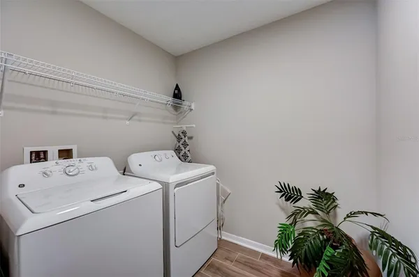 a utility room with dryer and washer